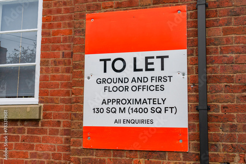 To let offices board sign on the side of a building