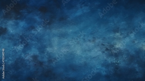 Midnight blue color. Abstract blue textured background resembling a cloudy sky or a rough sea surface, with hints of a brushed artistic effect. 