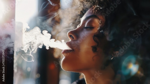 Close up of a woman inhaling from an electronic cigarette