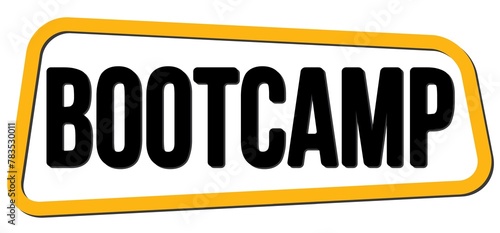 BOOTCAMP text on yellow-black trapeze stamp sign.