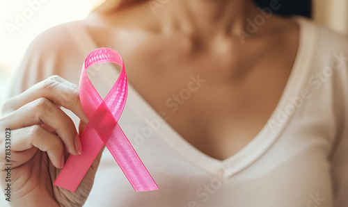 October Breast Cancer Awareness Month Woman with Hand Ribbon