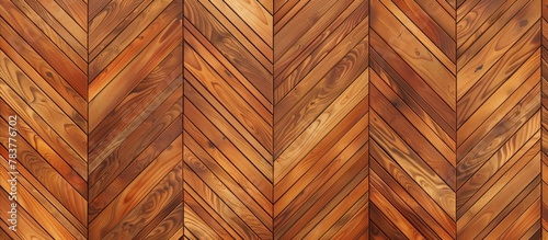 Close-up view of a wooden floor featuring a detailed herringbone pattern, creating a visually appealing texture for interior design