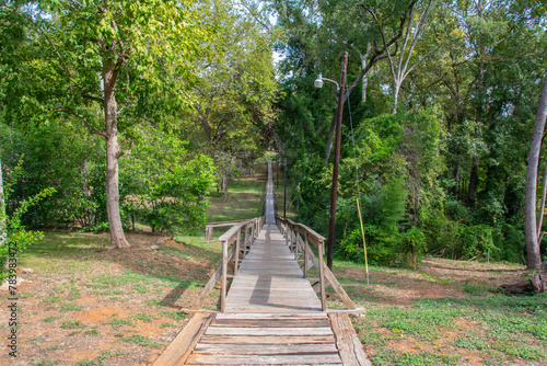 The 546-foot Rusk Footbridge constructed in 1861 to allow passage over a flooded creekbed just off of the courthouse square in downtown Rusk, Cherokee County, Texas, USA