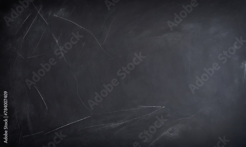 Old chalk black board. Used blackboard with chalk stain. blank chalkboard background