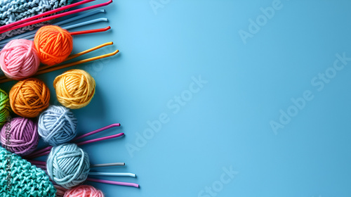 Multicolored crochet hooks with balls of yarn