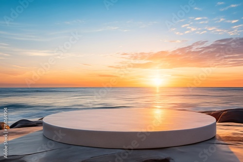 Empty round stone podium with background of beach sunset light and summer weather
