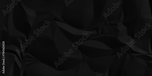 Dark black crumple paper wrinkled poster template ,blank glued creased paper texture background. black paper crumpled backdrop background. used for cardboard. 