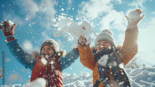 Children having fun playing in the snow, perfect for winter activities concept