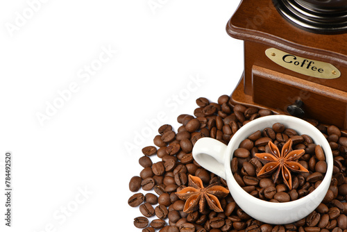 Star anise and coffee beans in a mug