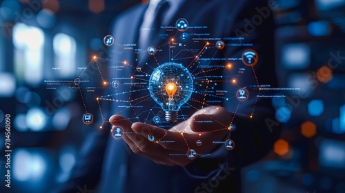 Business professional holding a glowing digital brain, representing artificial intelligence and innovation in technology. 