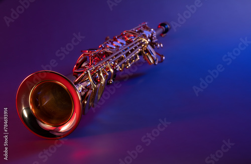 Soprano Saxophone with Colorful Red and Blue Jazzy Lighting and Negative Space