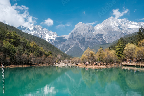 Nature view blue moon valley or Baishuhe River and Jade Dragon Snow Mountain with blue sky background in morning time in Shangri-La or Xiang Ge Le La, Lijiang city at Yunnan, China