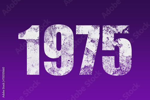 flat white grunge number of 1975 on purple background.