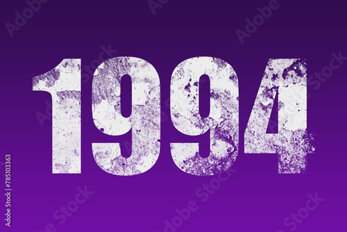 flat white grunge number of 1994 on purple background.