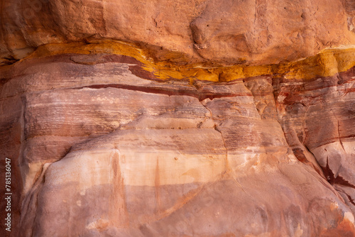 Sandstone rock and mineral layers in Petra, Jordan