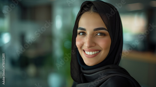 A smiling Arab businesswoman Wearing UAE Emirati Traditional Dress, black abaya, stands in her office, Arabian Pretty Woman in the Emirates, generative ai.