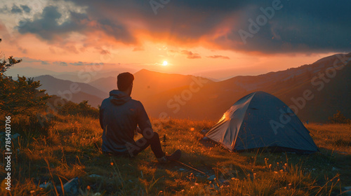 Man Camping at Sundown