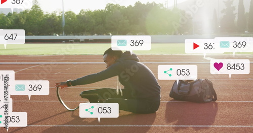Image of notification bars over african american athlete performing stretching on race track