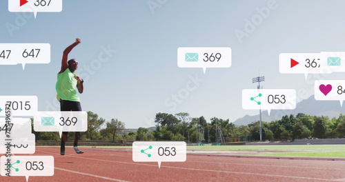 Image of notification bars, african american athlete running and raising hand for completing lap