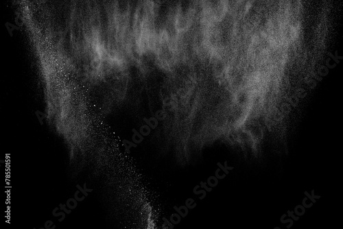 Abstract white dust on black background. Light smoke texture. Powder explosion. Splash water overlay. 