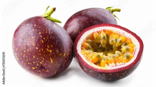 A passion fruit presented isolated on a white background, featuring both a whole fruit and a halved section.