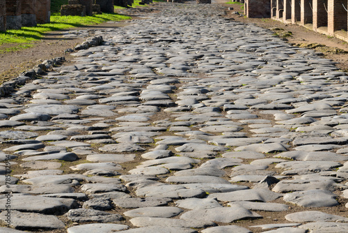 Ancient roman road in Ostia Antica. Rome, Italy