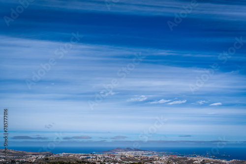 Landscape of the city of Las Palmas de Gran Canaria from the top of a mountain with horizontal clouds