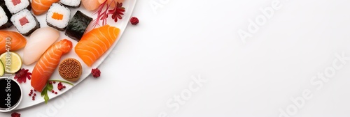 Assorted sushi plate on white background, wide banner for culinary articles and restaurant menu design, copyspase for text.