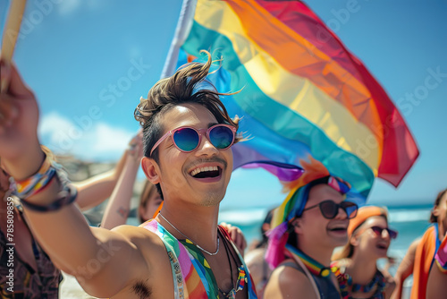 Young latin man celebrating LGBTQ Pride Parade outdoors at the beach. Generative AI.