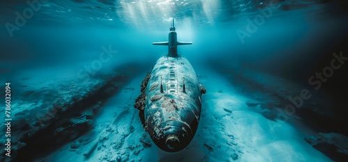 A submarine is seen in the water with a sandy bottom