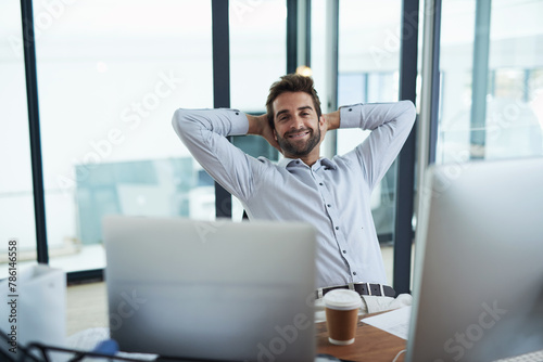 Portrait, business and man at desk, relax and stretching with break and peaceful with success. Face, happy person and professional with smile and easy project with finished assignment and resting