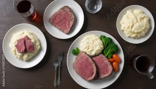 Traditional Irish dinner with corned beef, soda bread and colcannon overhead shot