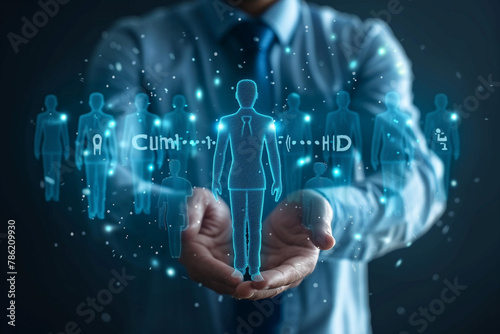 Businessman showing virtual graphic human icon for human development recruitment leadership and customer target group concept. HRM or Human Resource Management