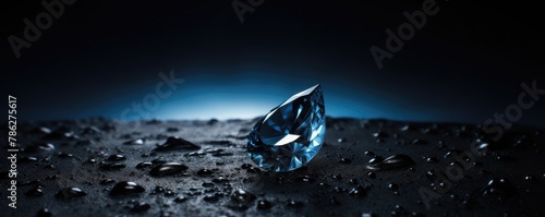 Beautiful shinning blue diamond on the black background.