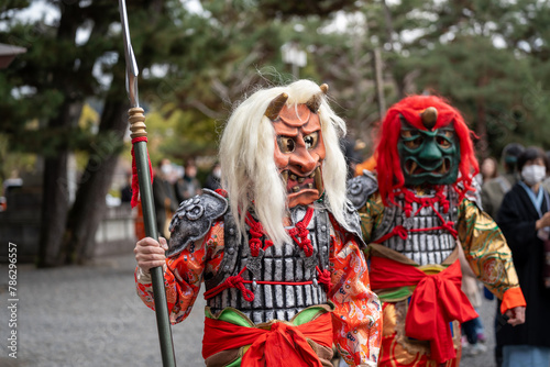 Kyoto, Japan - February 3 2024 : Heian Jingu Shrine Setsubun festival. Performers wearing an oni ( demon or ogre ) costume in the traditional Japanese shinto ritual ceremony.