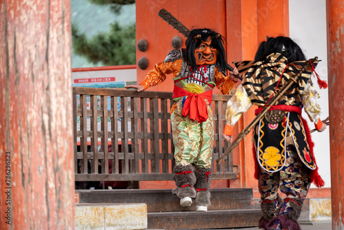 Kyoto, Japan - February 3 2024 : Heian Jingu Shrine Setsubun festival. Performers wearing an oni ( demon or ogre ) costume in the traditional Japanese shinto ritual ceremony.
