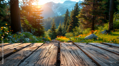 Wooden boardwalk in the mountains at sunset. Beautiful summer landscape.
