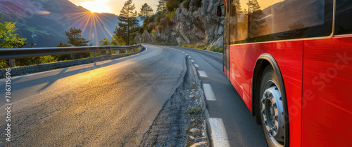 close up of large comfortable passenger bus riding on the highway at sunset with copy space