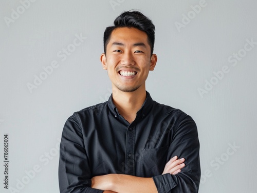 Asian startup co-founder optimistic smile