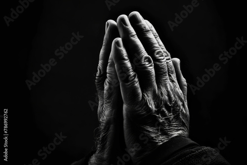 Faith, christian and praying hands in dark background with trust, hope and gratitude with prayer. Mockup space, spirituality and religion to seek guidance, wisdom or blessings for personal growth