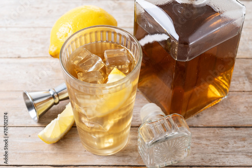 Highball, Whiskey with soda and lemon beverage on wooden table