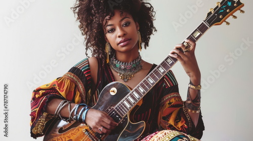 Folk singer with colorful attire playing instrument, fitting for world music and fashion.