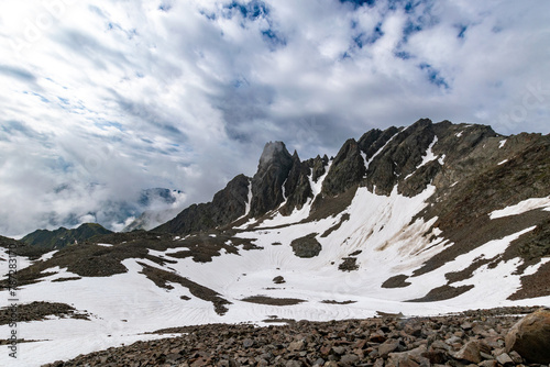 high alpine terrain with scree and snow fields (Tyrol, Austria)