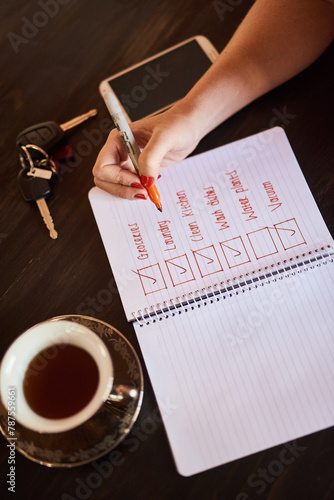 Person writing, tick or hands with notebook and schedule for daily routine, checklist with coffee. Above, organise and to do list in home with notepad, page and book for planning to write a article