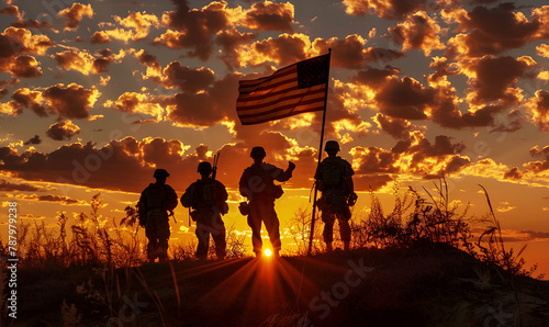 Silhouetted soldiers standing with a flag against a dramatic sunset sky, evoke the iconic Iwo Jima scene representing sacrifice and victory. 