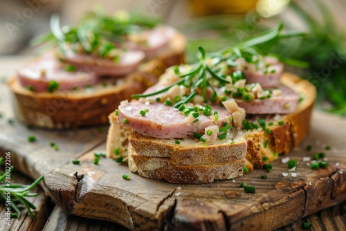 Delicious liverwurst and chive sandwiches on table