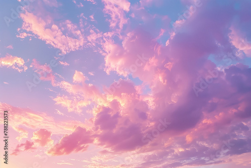 A serene pastel purple sky at dusk with delicate clouds. Beautiful purple and pink clouds fill the sky at sunset