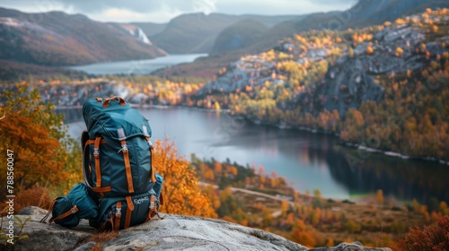 beautiful TRAVEL backpack ON A STONE and a beautiful landscape of a lake