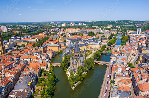 Metz, France. New Temple - Protestant Church. Moselle River. Panorama of the city on a summer day. Sunny weather. Aerial view