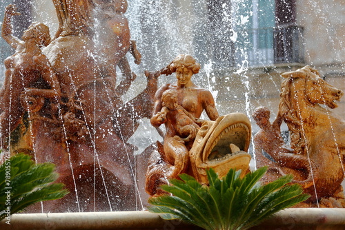 Close-up on details of Artemis fountain (or Diana fountain, dated from 1906) located on Piazza Archimede (Archimede square) in Ortigia Island, Syracuse, Sicily, Italy